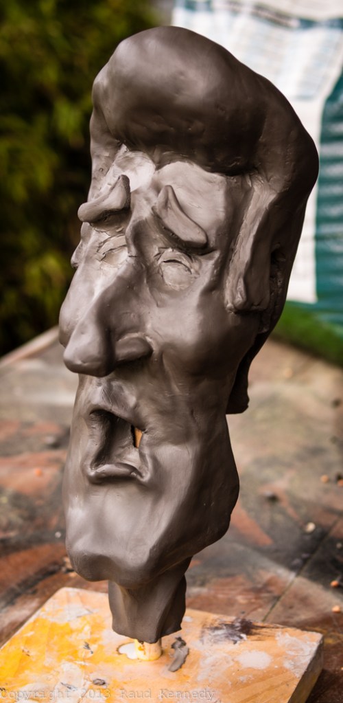 I figured the ceramic dogs needed a ceramic dude to speak nonsense to them.